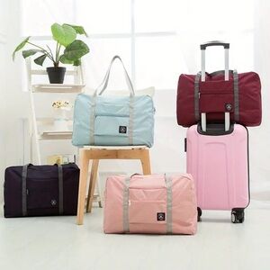 Travel bag - nylon zippered - Navy color remaining.  New in package.